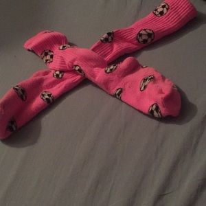Pink long socks with soccer balls